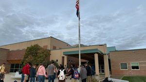 Praying with Students at the School Flag Pole